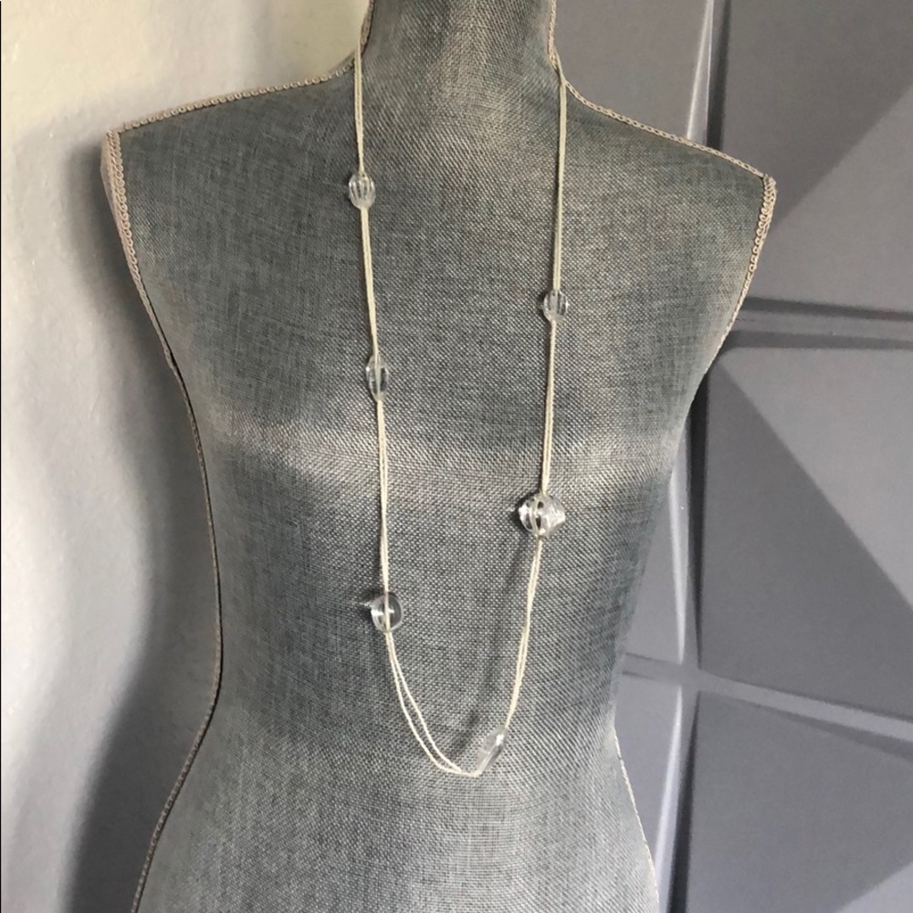 Long white beaded necklace